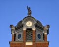 `The Night Watchman` by Jack Bryant atop Grapevine City Hall in the historic district of Grapevine, Texas. Royalty Free Stock Photo