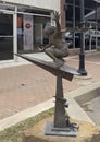 Bronze sculpture titled \'Paper Airplane\' by Gary Lee Price in downtown Edmond, Oklahoma.