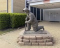 Bronze 9 - 11 Tribute Sculpture by artist Nyal Stromberg in front of the Garland Fire Department.