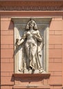 Ancient Egyptian statue of a woman on the front of the Museum of Egyptian Antiquities in Cairo, Egypt. Royalty Free Stock Photo