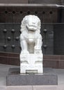 White marble female guardian lion at entrance to the Crow Museum of Asian Art in downtown Dallas, Texas
