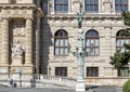 Classic lampost topped with bronze green angel statue, front of the Natural History Museum, Maria-Theresien-Platz, Vienna, Austria Royalty Free Stock Photo