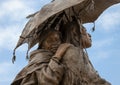 Closeup view of a bronze sculpture titled `Honeymoon at Crow Fair` by John Coleman in Edmond, Oklahoma.