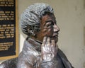 Closeup view of the head of a bronze statue of Washington Irving in Washington Irving Memorial Park in Bixby, Oklahoma.