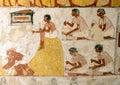 Closeup view of part of the middle portion of the fresco in TT69 with Menna seated overseeing crop measurement and field work.