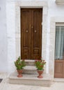Closeup view of steps and front door of a home in Locorotondo, southern Italy Royalty Free Stock Photo