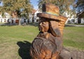 Closeup view of wooden sculpture water goblin, The Village of Holasovice, Czech Republic Royalty Free Stock Photo