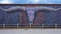Colorful mural with Longhorn steer on a building on Singleton Blvd in Dallas, Texas.