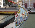 Colorful saucy painting on the front of a moliciero in Aveiro, the Venice of Portugal. Royalty Free Stock Photo