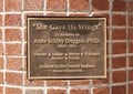 Dedication plaque for `She Gave Us Wings` by Rosanne Keller on the campus of the Texas Women`s University in Denton.