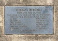 Dedication plaque for a granite obelisk memorial honoring all Veterans in Vandergriff Park in the City of Arlington, Texas.