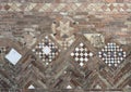 Detail of brickwork at one end of the Pilate Courtyard in the Basilica of Saint Stephen in Bologna, Italy.