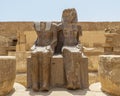 Statue of Ramesses and Maat, Hypostyle Hall past the second court of the Mortuary Temple of Ramesses III in Medina Habu. Royalty Free Stock Photo