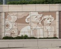 Distinctive wall mural featuring the railroad and people along Interstate 30 in Arlington, Texas.