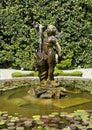 Eighteenth-century basin with fountain statue in the Italian garden of the Villa Carlotta in Tremezzo.