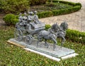 Detailed bronze sculpture of a horse drawn carriagne in the front of a mansion in Highland Park, Dallas, Texas. Royalty Free Stock Photo