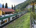 Trenord train leaving the Varenna-Esino-Perledo Train Station in Perledo, Italy.