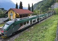 Trenord train leaving the Varenna-Esino-Perledo Train Station in Perledo, Italy.