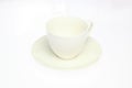 Empty coffee cup and saucer in a white background Royalty Free Stock Photo