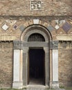 Entrance portal, front facade of the Church of the Saints Vitale and Agricola on Saint Stephen Square in Bologna, Italy. Royalty Free Stock Photo