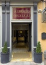 Entrance to the Art Hotel Albergo Orologio at the center of Bologna, Italy.