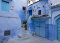 House entrance with staircase and plants in Chefchaouen, a city in northwest Morocco noted for its buildings in shades of blue. Royalty Free Stock Photo