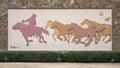 The first of five bas-relief panels by cowboy artist Tom Ryan on the western facade of the National Cowboy Museum in Oklahoma City Royalty Free Stock Photo