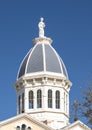 10 foot statue of the goddess of justice atop the cupola of the Presidio County Courthouse in Marfa, Texas.