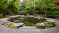 Fountain and garden titled `Genesis Garden` in the Dallas Arboretum and Botanical Garden