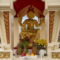 Four-faced Buddha statue in a pavilion at the Buddhist Center of Dallas, Texas.