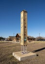 Wooden monument painted with wildflowers, a project of the Elm Fork Chapter of Master Naturalist in Carrollton, Texas.