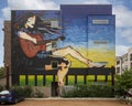 Four-story mural by the blind artist John Bramblitt on Bishop Highline Apartments in the Bishop Arts District in Oak Cliff.