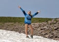 Fourteen year-old Caucasian girl posing enthusiastically in Mount Rainier National Park, Washington