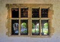 French 15th century limestone window in the Cloisters in New York City.