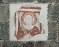 Fresco of a saint with a broadsword in the Church of Santa Maria del Tiglio in Gravedona.