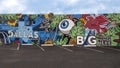 `Welcome to Dallas` mural on the side of a building at 2714 Commerce Street in Deep Ellum, Texas.