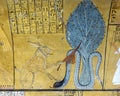 Great Cat of Heliopolis killing the serpent Apophis under the Iched Tree in TT359, Tomb of Inerkhau in Deir el-Medina. Royalty Free Stock Photo