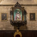 Half-length wooden sculpture of Jesus with polychrome behind glass inside the Seville Cathedral in Seville, Andalusia, Spain.