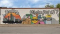 Humorous mural on the side of a building in Oak Cliff during the Coronavirus pandemic.