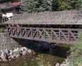 Covered Bridge across Gore Creek in Vail Village, Colorado. Royalty Free Stock Photo