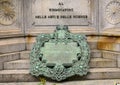 Inauguration Plaque, front of the monument to Leonardo Da Vinci in Piazza della Scala Square, Milan, Italy. Royalty Free Stock Photo