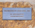 Information plaque for a bronze sculpture titled `Honeymoon at Crow Fair` by John Coleman in Edmond, Oklahoma.