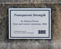 Information plaque for `Transparent Strength` by Damion Priour in 2006, part of the public art collection of Frisco, Texas. Royalty Free Stock Photo