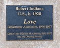 Information plaque for the `Love` sculpture by Robert Indiana on the Oklahoma University campus in Norman. Royalty Free Stock Photo
