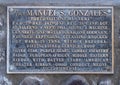 Information plaque for a small bronze statue of Sargent Manuel Gonzales on the Courthouse lawn in Fort Davis.