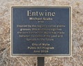 Information plaque for `Entwine` by Michael Szabo in the City of Wylie, Texas.