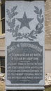 Baseof a marble statue of James A. Throckmorton by Pompeo Coppini outside the historic old Collin County Courthouse in McKinney