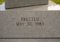 Inscription base of granite obelisk memorial honoring all Veterans in Vandergriff Park in the City of Arlington, Texas. Royalty Free Stock Photo