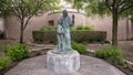 `Joseph Teaching Jesus`, a life-size metal sculpture at Saint Joseph Catholic Church in Arlington, Texas.