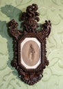 King Ferdinand II in an ornate wooden frame in the Green room of the Pena Palace in Sintra, Portugal. Royalty Free Stock Photo